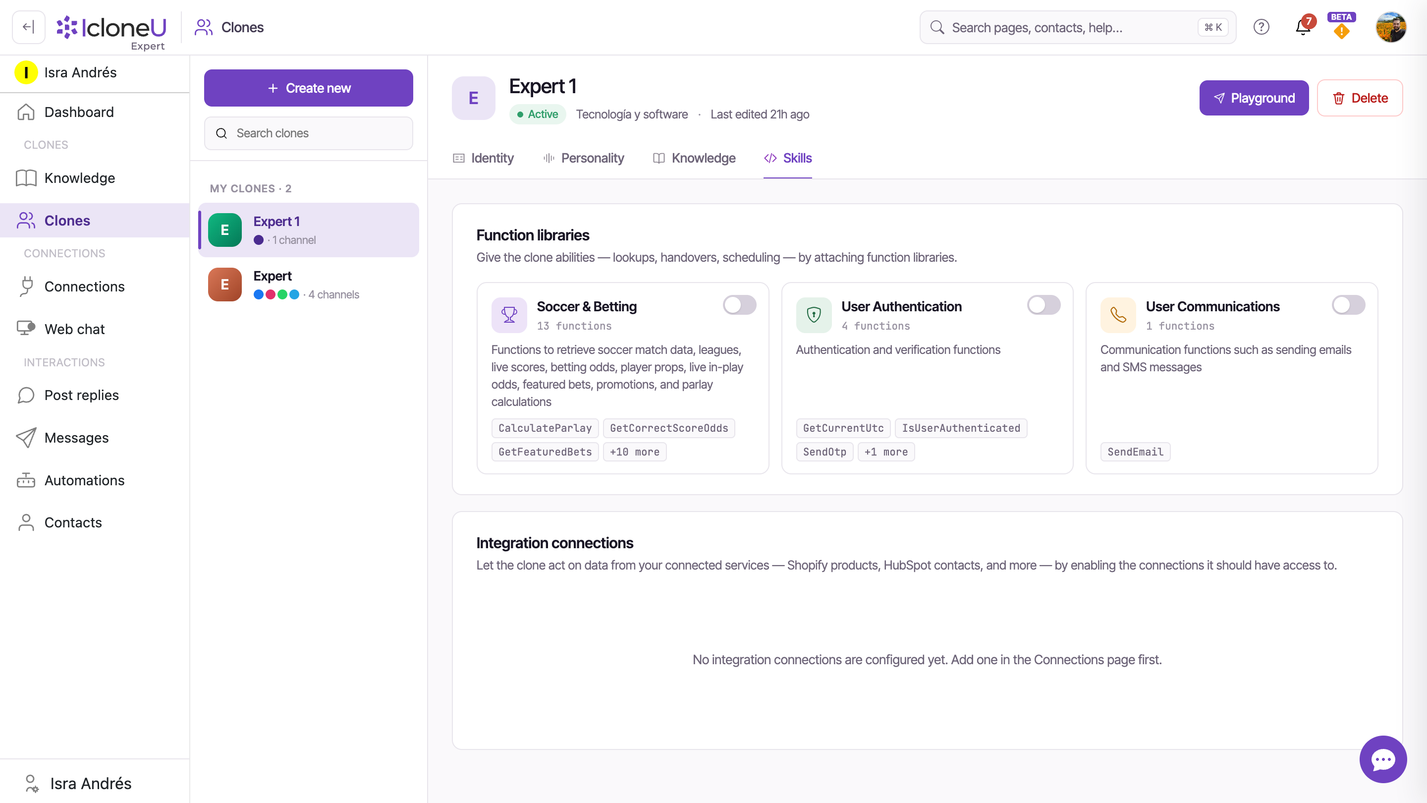 The Skills tab Function libraries section showing the three pre-built library cards (Soccer & Betting, User Authentication, User Communications), each with its toggle, function count and sample-name chips